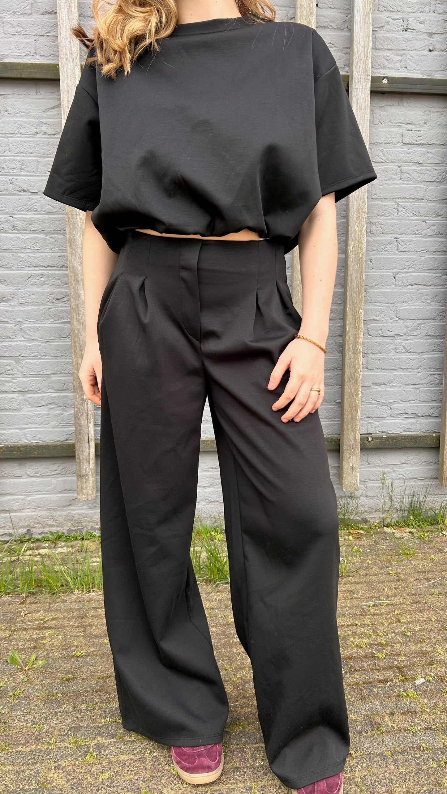 Zwarte getailleerde tracksuit