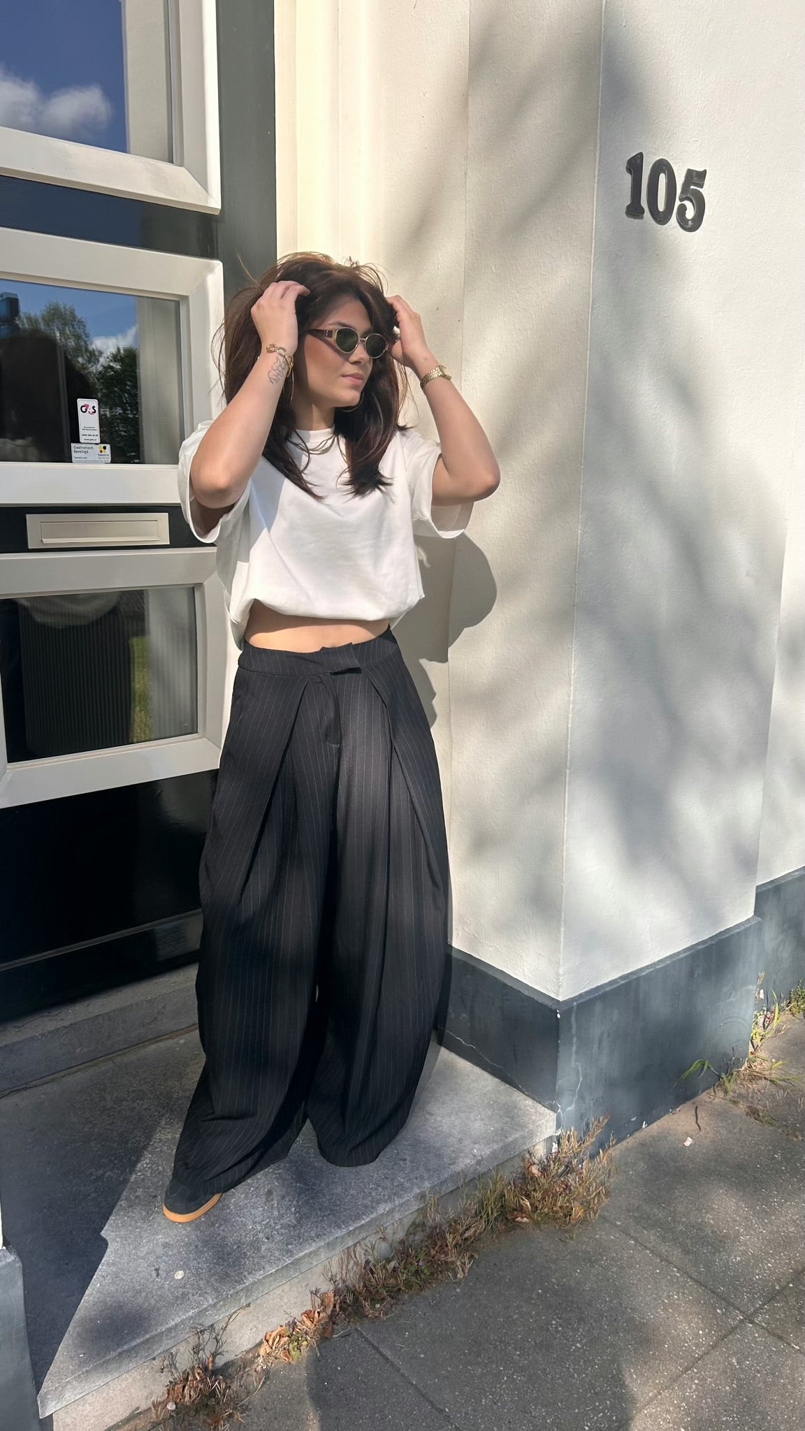 Zwarte pintstripe pleated pantalon